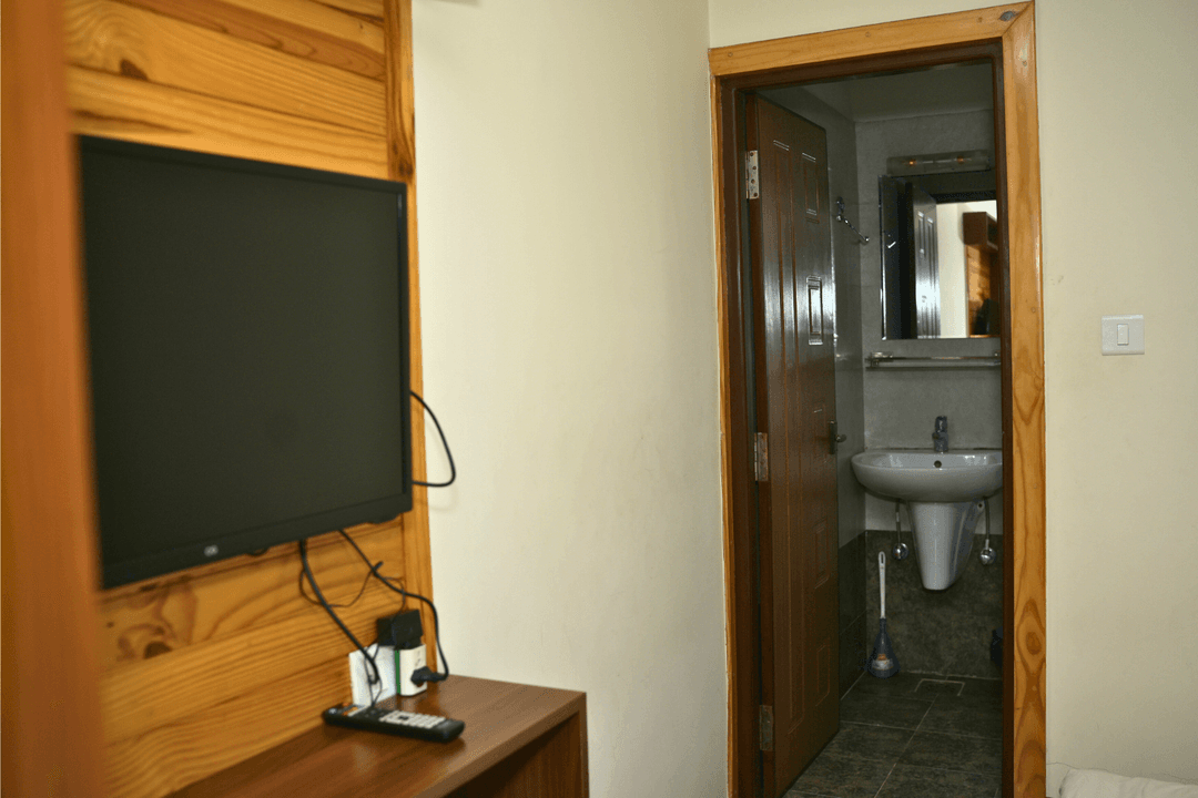 Doble bed room with attached bathroom image 3