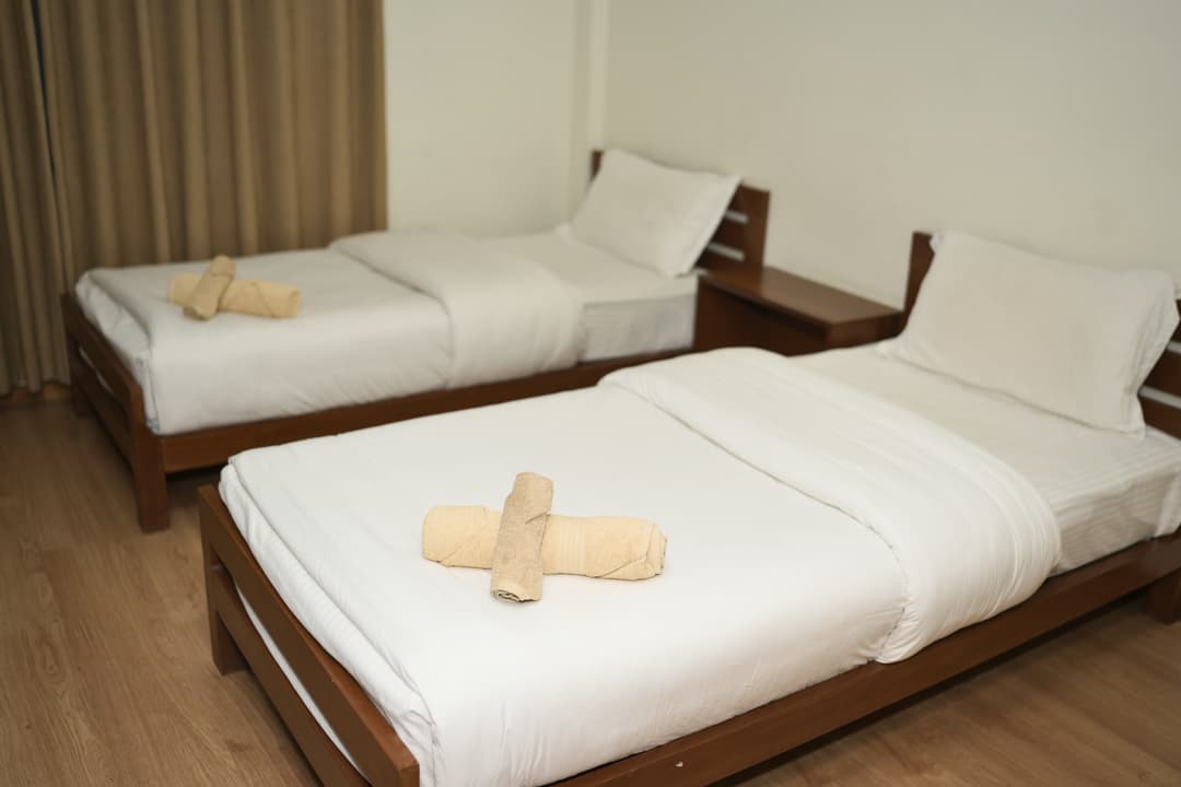 Twin room with attached bathroom image 2