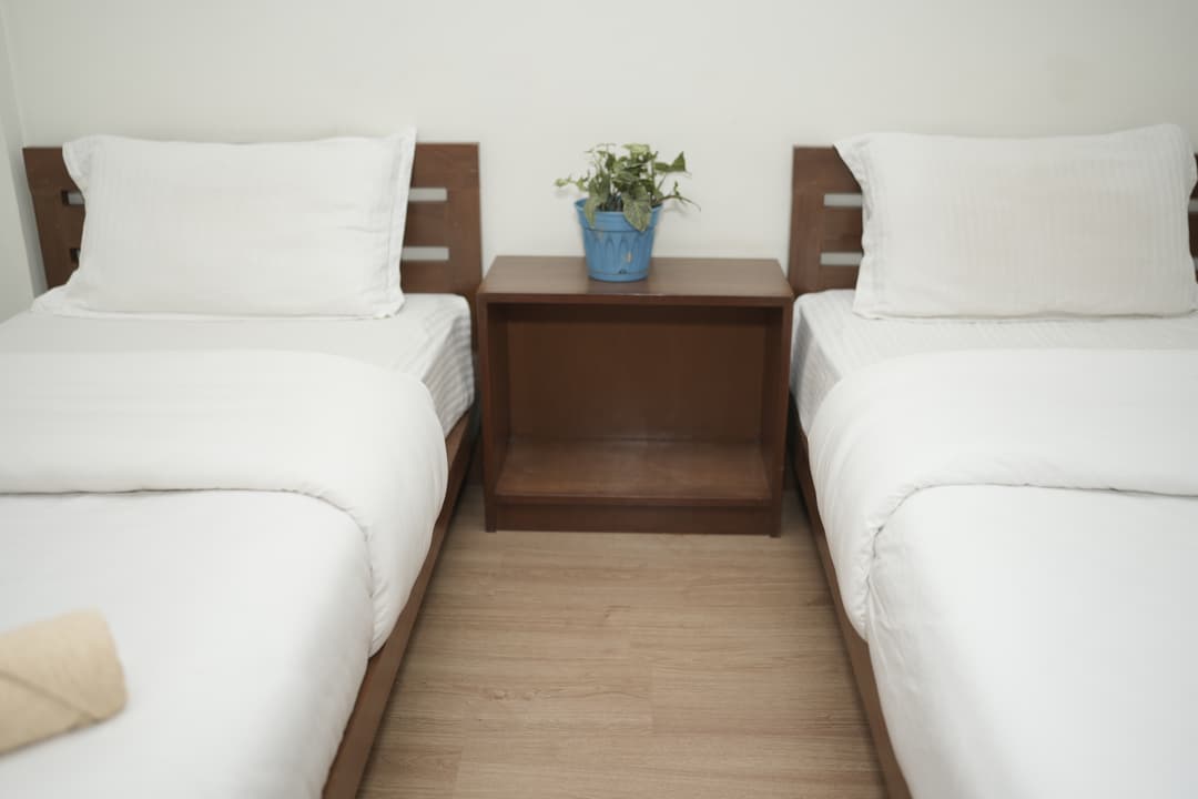 Twin room with attached bathroom image 1