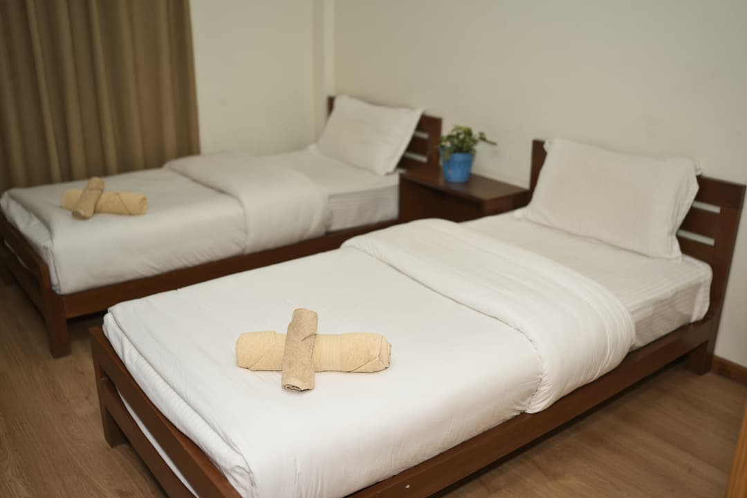 Twin room with attached bathroom image 3