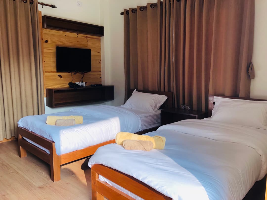 Twin room with attached bathroom image 5